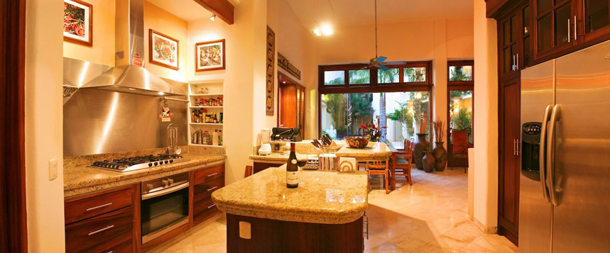 Villa dinging area with view to pool.